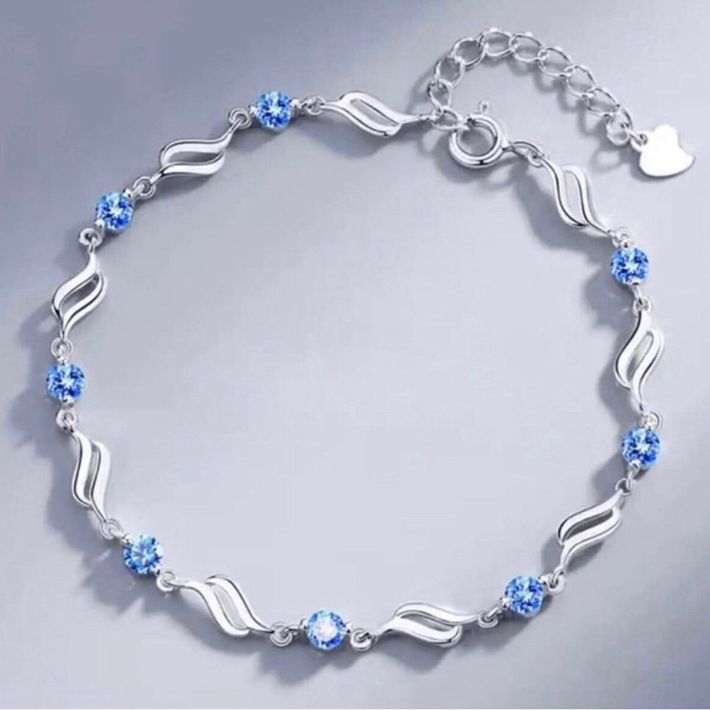 Delicate Sterling Silver Bracelet with Light Blue Crystals